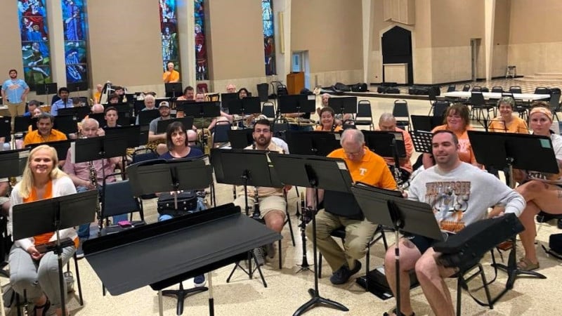 TWS members wearing orange for the national champion Vols!